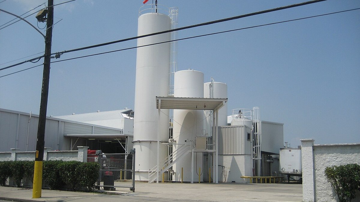 Commercial milk processing plant stainless steel storage tanks and sanitary fluid transfer lines